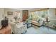 Bright living room with hardwood floors, neutral walls, and plenty of natural light at 4021 Converse Dr, Raleigh, NC 27609