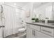 Clean bathroom showcasing a tub-shower combination, gray countertop, and sleek vanity at 427 Bluffberry Way, Hillsborough, NC 27278
