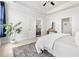 Spacious bedroom with doorway leading to kitchen and decorous furnishings at 427 Bluffberry Way, Hillsborough, NC 27278