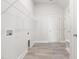 Well-lit laundry room with ample shelving and a utility sink hookup for convenience at 427 Bluffberry Way, Hillsborough, NC 27278