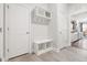 Functional mudroom with a bench, coat hooks, and ample storage for an organized entryway at 427 Bluffberry Way, Hillsborough, NC 27278