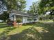 Exterior of a house showcasing its architectural details and landscaping with mature trees at 429 5Th & Brogden Rd, Smithfield, NC 27577
