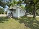 Side view of a house, showcasing its simple architecture and surrounding green lawn at 429 5Th & Brogden Rd, Smithfield, NC 27577
