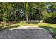 Spacious backyard with a stone patio and ample green space at 4913 Great Meadows Ct, Raleigh, NC 27609