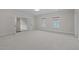 Spacious bonus room with neutral carpet and ample natural light at 4913 Great Meadows Ct, Raleigh, NC 27609