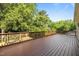 Expansive wooden deck overlooking a lush, green backyard perfect for entertaining at 4913 Great Meadows Ct, Raleigh, NC 27609