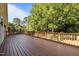 Large wood deck providing an outdoor living space with backyard views at 4913 Great Meadows Ct, Raleigh, NC 27609