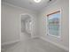 Bonus room features arched doorway and natural light at 4913 Great Meadows Ct, Raleigh, NC 27609