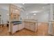 Open concept kitchen with stone countertops, stainless steel range, and decorative tile backsplash at 4913 Great Meadows Ct, Raleigh, NC 27609