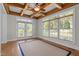 Bright sunroom with coffered ceilings and large windows at 4913 Great Meadows Ct, Raleigh, NC 27609