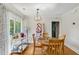 Charming dining room with stylish lighting, and view to the kitchen at 492 N Dunn St, Angier, NC 27501