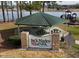 A cozy picnic shelter with tables in Jack Marley Park near the playground and the lake at 492 N Dunn St, Angier, NC 27501