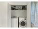 Closet with stacked washer and dryer at 492 N Dunn St, Angier, NC 27501