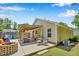 Expansive backyard with a patio, outdoor seating, and a charming wooden pergola at 512 Wyndham Dr, Fuquay Varina, NC 27526