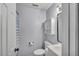 Bathroom featuring a white vanity, toilet and mirror at 512 Wyndham Dr, Fuquay Varina, NC 27526