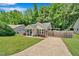 Charming single-story home featuring a manicured lawn and inviting front porch area at 512 Wyndham Dr, Fuquay Varina, NC 27526