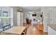 Open concept design living and dining area with hardwood floors and fireplace at 512 Wyndham Dr, Fuquay Varina, NC 27526