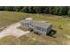 A well-maintained single-story home boasts an open yard and covered carport at 540 Pine Ridge Rd, Zebulon, NC 27597
