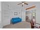 Bright office space featuring custom built-ins, a blue couch and charming decor at 540 Pine Ridge Rd, Zebulon, NC 27597