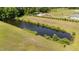 Beautiful pond surrounded by lush greenery, creating a peaceful setting at 540 Pine Ridge Rd, Zebulon, NC 27597