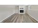 Finished basement with updated floors and painted fireplace at 5529 Wood Pond Ct, Raleigh, NC 27610