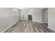 Basement featuring updated floors and stairs at 5529 Wood Pond Ct, Raleigh, NC 27610