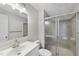 Bathroom featuring a shower, toilet, vanity with sink and a mirror, with neutral walls at 5529 Wood Pond Ct, Raleigh, NC 27610