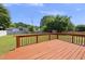 View of a spacious, stained wood deck perfect for outdoor entertaining and relaxation at 5529 Wood Pond Ct, Raleigh, NC 27610