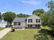 Charming split-level home featuring a well-maintained lawn and classic black shutters at 5529 Wood Pond Ct, Raleigh, NC 27610