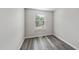 Room featuring updated floors and natural light at 5529 Wood Pond Ct, Raleigh, NC 27610