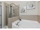 Bright bathroom with tub and walk-in shower at 5936 Hourglass Ct, Raleigh, NC 27612
