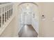 Bright foyer with chandelier and hardwood floors at 5936 Hourglass Ct, Raleigh, NC 27612