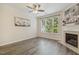 Inviting living room with fireplace and large windows at 5936 Hourglass Ct, Raleigh, NC 27612