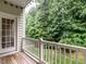 Enjoy the view from this charming balcony, perfect for relaxing in the outdoors at 6206 Braidwood Court Ct, Raleigh, NC 27612