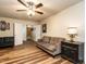 Comfortable living room with hardwood floors, neutral walls, and plenty of space for relaxation at 6206 Braidwood Court Ct, Raleigh, NC 27612