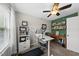 Comfortable office features a ceiling fan, desk, and a treadmill for active work sessions at 6236 Pesta Ct, Raleigh, NC 27612