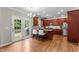 Eat-in kitchen with granite countertops and stainless steel appliances at 712 Brittley Way, Apex, NC 27502