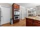 Custom kitchen with granite countertops and stainless appliances at 712 Brittley Way, Apex, NC 27502