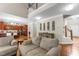 Spacious living room with hardwood floors and stairs to a second floor balcony at 712 Brittley Way, Apex, NC 27502