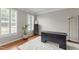 Bright home office with hardwood floors and a large window at 712 Brittley Way, Apex, NC 27502