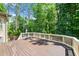 Spacious deck offers ample room for outdoor dining and relaxation with scenic backyard views at 7552 Hasentree Club Dr, Wake Forest, NC 27587