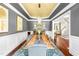 Formal dining room with elegant lighting and decorative millwork at 7552 Hasentree Club Dr, Wake Forest, NC 27587