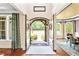 Welcoming foyer with hardwood floors and an open view to the front yard at 7552 Hasentree Club Dr, Wake Forest, NC 27587