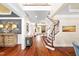 Bright open foyer leading to the living room and staircase at 7552 Hasentree Club Dr, Wake Forest, NC 27587