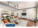 Open floorplan living room with high ceilings, stylish decor, and natural light at 7552 Hasentree Club Dr, Wake Forest, NC 27587