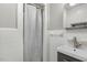 Cozy bathroom with tiled shower, modern sink, and vanity, offering a functional and clean design at 780 Leslie Campbell Ave, Lillington, NC 27546