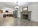 Open concept dining room leads into a modern kitchen with stainless appliances at 780 Leslie Campbell Ave, Lillington, NC 27546