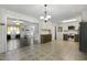 Open floor plan showing the dining room with the kitchen and living room at 780 Leslie Campbell Ave, Lillington, NC 27546