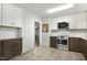 Kitchen showcasing stainless steel appliances and updated cabinetry at 780 Leslie Campbell Ave, Lillington, NC 27546
