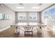 This game room has hardwood floors, natural light, and a professional-grade ping pong table for hours of entertainment at 797 S Wilma St, Angier, NC 27501
